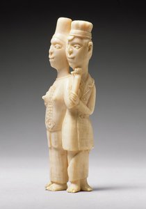 Figuren van een man in Europese kleding en een Afrikaanse vrouw, Congo